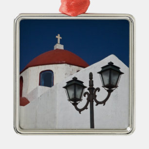 Greece, Mykonos, Chapel with red dome and Metal Tree Decoration