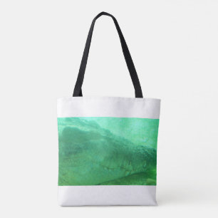Green alligator face on a fabric tote bag