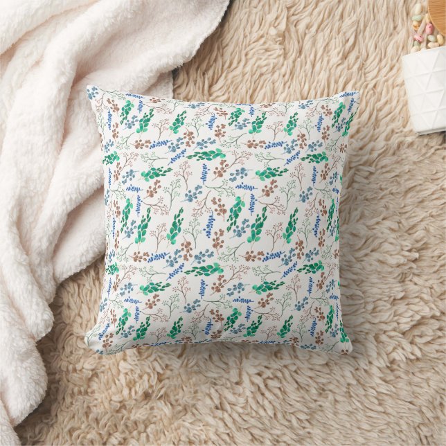 Green and blue botanical pattern on white cushion (Blanket)