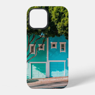 Green and blue houses beside trees on sidewalk iPhone 12 case