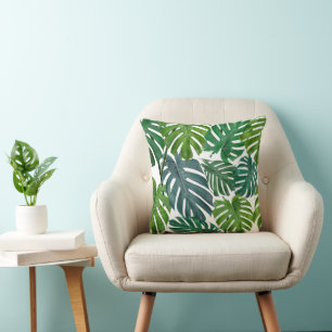 Green and blue palm leaves cushion