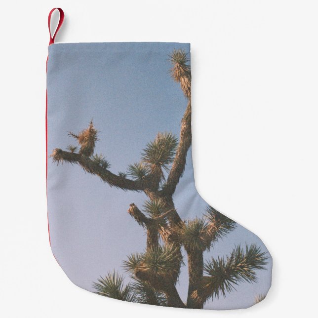 GREEN AND BROWN TREE UNDER BLUE SKY SMALL CHRISTMAS STOCKING (Front)