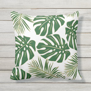 Green and gold monstera, palm tropical leaves cushion