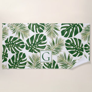 Green and gold tropical leaves and monogram beach towel