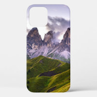 GREEN AND GRAY MOUNTAINS UNDER WHITE CLOUDS DURING