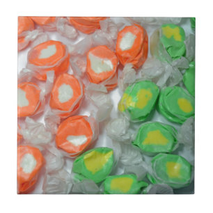 Green and orange taffy candy ceramic tile