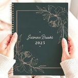 Green And Pink Floral Border 2025 Custom Name Planner<br><div class="desc">Step into a world of botanical beauty with this elegant planner. A graceful floral border in soft pink graces the deep green cover, creating a haven of tranquillity for your thoughts and plans. Imagine yourself jotting down your dreams and appointments amidst a garden of inspiration. Personalise it with your name...</div>