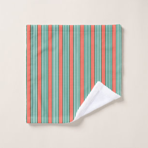 Green and white five stripe pattern with coral wash cloth