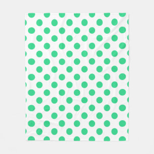 Green and white polka dots fleece blanket