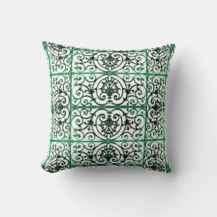 Green and white scrollwork pattern cushion