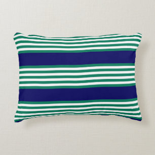 Green and white stripes pattern with navy blue decorative cushion