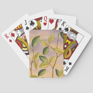 Green and Yellow Leaves on Sunset Background Playing Cards