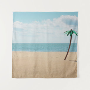 Green artificial palm tree on seashore tapestry