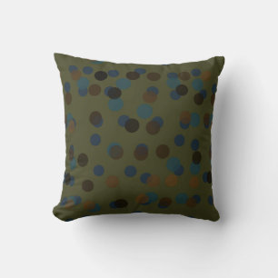 green, blue, brown, bronze, and black polka dot cushion
