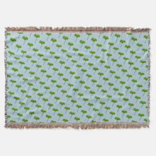 Green blue poppy flower on blue throw blanket