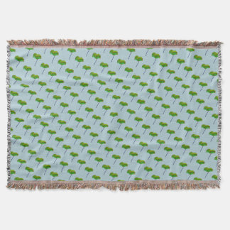 Green blue poppy flower on blue throw blanket