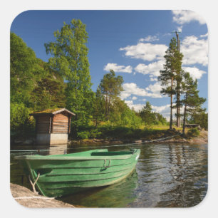 Green boat in a fjord in Norway Square Sticker