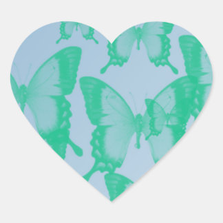 green butterflies in blue background heart sticker
