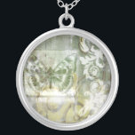 Green Butterfly Inset with Ironwork Gate Silver Plated Necklace<br><div class="desc">Jennifer Goldberger painted this stunning piece. A green butterfly inset rests atop an ironwork gate. A very avant-garde painting,  it has a lot going on that is hidden behind fading colours and splotches of patterns. This would make a great gift for someone who loves modernist art!</div>