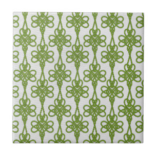 Green Celtic Knot Design on White Ceramic Tile