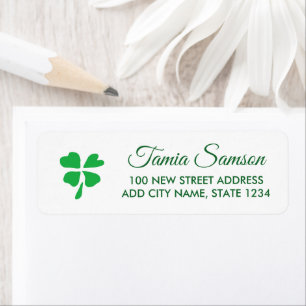 Green clover leaves drawing on white return address label