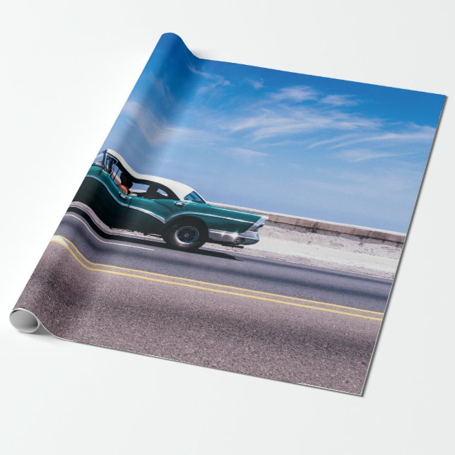 Green coupe on grey asphalt road wrapping paper (Unrolled)