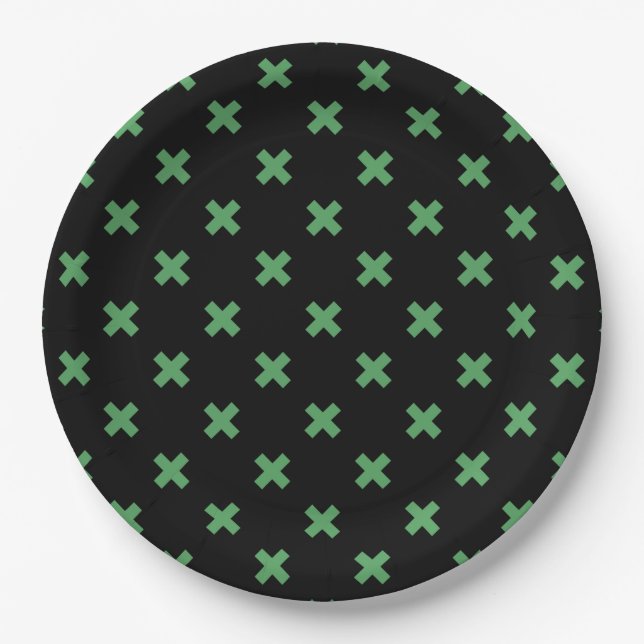 Green cross stitches on black paper plate (Front)