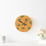 Green Eggs and Ham Pattern Round Clock<br><div class="desc">This officially licensed Dr. Seuss design features a seamless, repeating pattern of the classic green eggs and ham on a platter illustration. The iconic dish is scattered across a solid orange background, accompanied by the text "Green Eggs and Ham" in a matching green font. This nostalgic and recognisable pattern perfectly...</div>