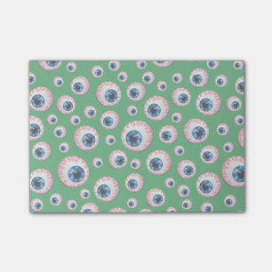 Green eyeball pattern post-it notes