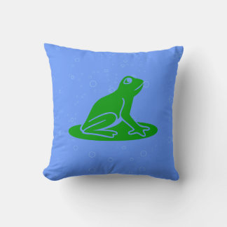 green frogs on blue pillow