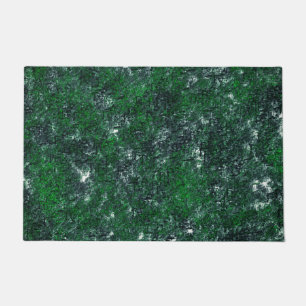 Green fungus upon whitish grey rock or tree trunk  doormat