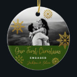 Green Gold Snowflakes First Christmas Engaged Ceramic Ornament<br><div class="desc">Bright Christmas holiday photo ornament with gold snowflakes and bright green background for engaged couple. Personalise it by adding your names. It's a good gift for newly weds or for a fiance/fiiancee.</div>