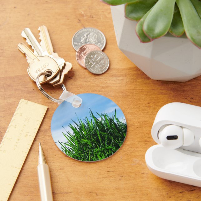 Green grass against the background of the endless  key ring (Desk)