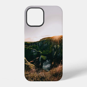 GREEN GRASS FIELD AND MOUNTAIN DURING DAYTIME iPhone 12 CASE