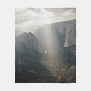 GREEN GRASS FIELD AND MOUNTAINS DURING DAYTIME FLEECE BLANKET