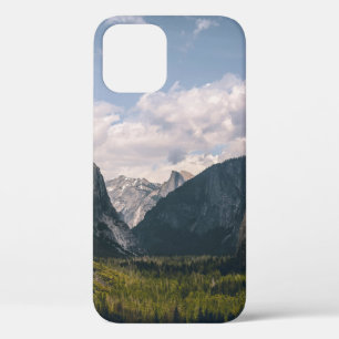 GREEN GRASS FIELD NEAR ROCKY MOUNTAIN UNDER WHITE iPhone 12 CASE
