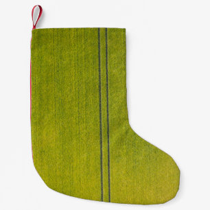 Green grass field small christmas stocking