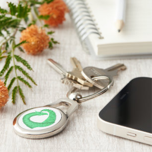 Green heart dragon on white key ring