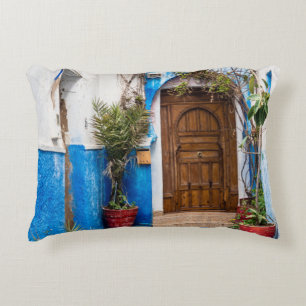 GREEN LEAFED PLANT NEAR WALL DECORATIVE CUSHION