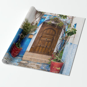 GREEN LEAFED PLANT NEAR WALL WRAPPING PAPER