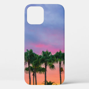 Green leaves tree under blue sky during golden hou iPhone 12 case