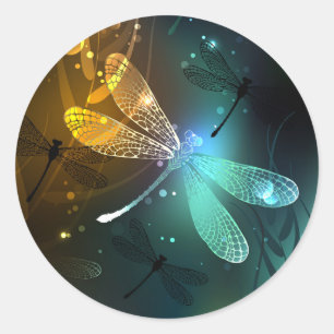 Green luminous dragonfly flight classic round sticker