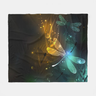 Green luminous dragonfly flight fleece blanket