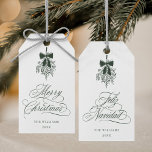 Green Mistletoe Merry Christmas | Feliz Navidad    Gift Tags<br><div class="desc">This holiday gift tag features elegant,  romantic swirly calligraphy with a winter mistletoe bouquet and a festive 'Merry Christmas' on the front,  along with 'Feliz Navidad' script on the back. For more advanced customisation of this design,  please click the BLUE DESIGN TOOL BUTTON above!</div>