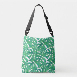 Green monstera tropical leaves pattern on white b crossbody bag