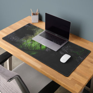 Green mossy rock with reflection in water desk mat