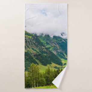 Green mountains covered with forest and green gras bath towel