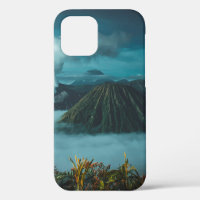 GREEN MOUNTAINS SURROUNDED BY WHITE CLOUDS