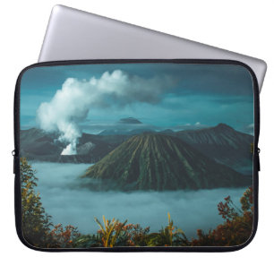 GREEN MOUNTAINS SURROUNDED BY WHITE CLOUDS LAPTOP SLEEVE
