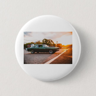 Green muscle car at sunset 6 cm round badge